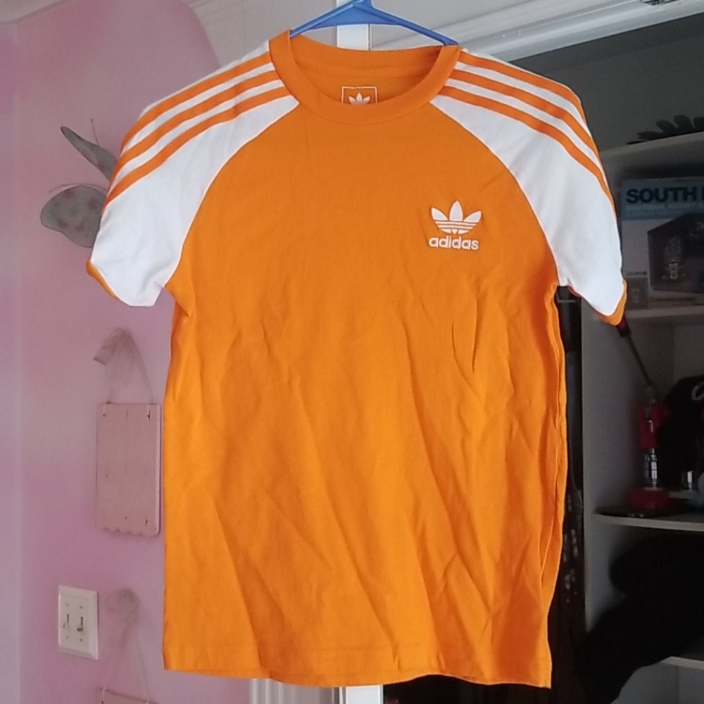 Gold Adidas tee with striped sleeves